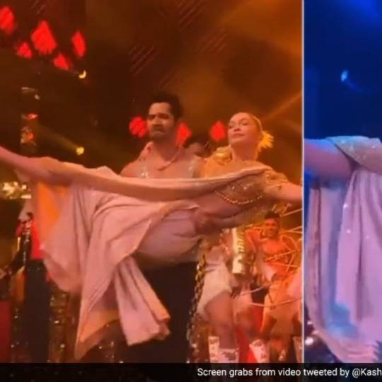 Varun Dhawan and Gigi Hadid do a small gig on the stage as he lifts her up in his arms
